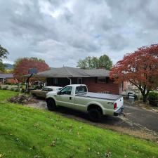 Residence-Roofing-Restoration-Transforms-Home-with-Dark-Bronze-Gutters-and-Gutter-Guards-in-Erwin-TN 1